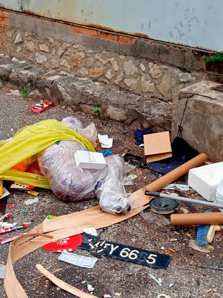 Stir after ‘body’ found among rubbish