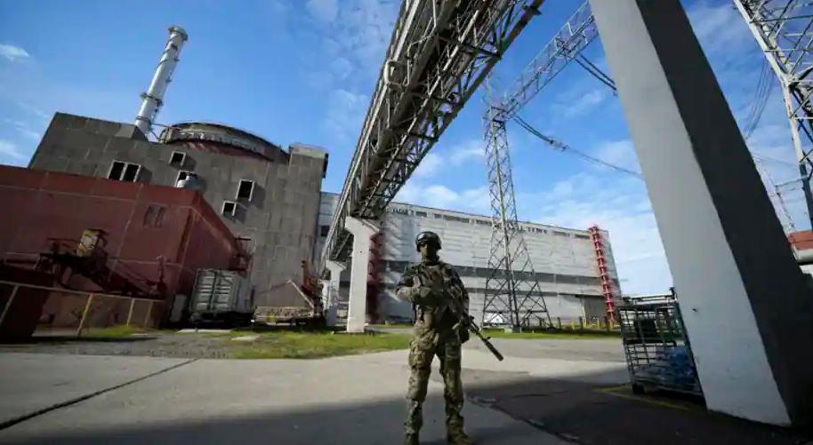 A Russian serviceman guards in an area of the Zaporizhzhia Nuclear Power Station in territory under Russian military control, southeastern Ukraine - AFPPIX